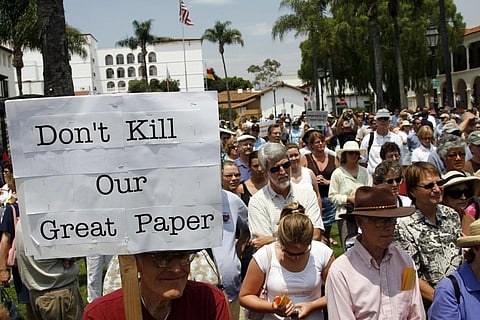 Members of the community fill De La Guerra Plaza in front of the Santa Barbara News-Press news paper's office during a rally on July 18, 2006. (File Photo | AP)