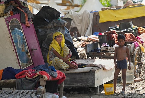 People affected with floods at a makeshift camp near the Old Yamuna Bridge (Loha Pul), in New Delhi, Monday, July 24, 2023. (PTI)