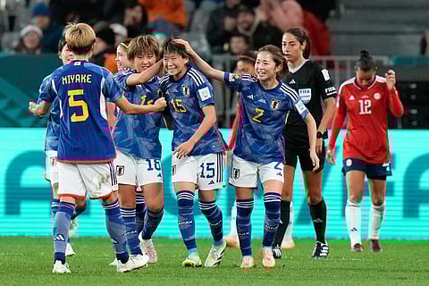 Japan's Aoba Fujino congratulated by teammates after scoring her team's second goal against Costa Rica. (Photo | AP)