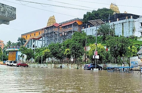 A sheet of water covers the area around Ramalayam as the Godavari levels rise past the 48 ft mark, forcing officials to raise the second warning in Bhadrachalam on Wednesday