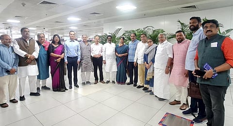A delegation of I.N.D.I.A parties MPs prior to leaving for violence-hit Manipur, at airport in New Delhi. (Photo | PTI)