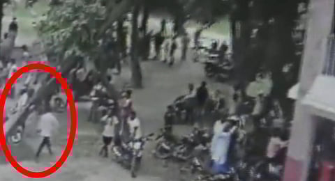 An unidentified person can be seen walking towards the crowd, police claimed the man shot at the mob.(Photo | Screengrab , ANI Twitter)