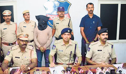 Police producing the arrested at a press conference in Sircilla on Sunday I express