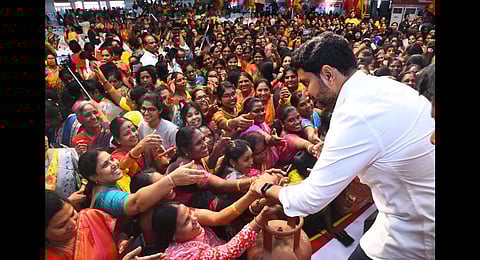 TDP general secretary Nara Lokesh interacting with women during the ‘Maha Sakthi Tho Lokesh’ programme organised in Nellore as part of Yuva Galam yatra. (Photo | Express)