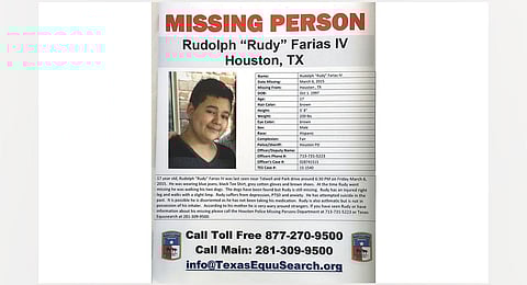 A missing poster for Rudolph 'Rudy' Farias IV is shown during the Missing Person Day event at City Hall Sunday, Jan. 31, 2016, in Houston. (Photo | AP)