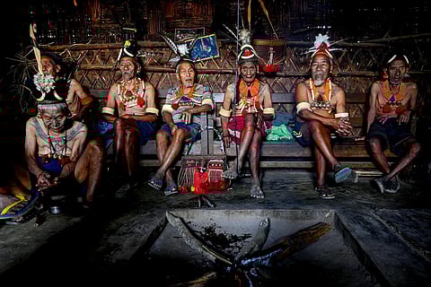 FILE - This photograph taken on April 8, 2023, shows Konyak tribesmen during a community gathering at a traditional tribal house in Hongphoi village in the Mon district of  Nagaland. (Photo | AFP)