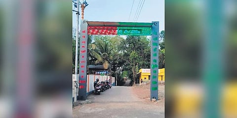 The common arch with one side displaying the temple’s address and the other side showcasing details about the mosque |  The donation box of the mosque and the temple on common platform