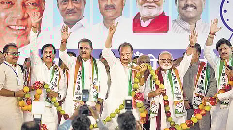 Deputy Chief Minister Ajit Pawar with his party colleagues Praful Patel, Sunil Tatkare and others at a meeting in Mumbai on Wednesday. (Photo| PTI)
