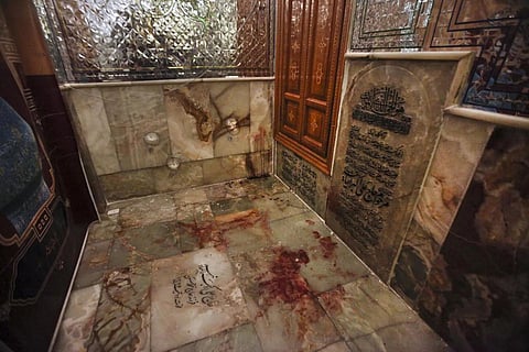 Bullet holes and blood stains seen on the floor of the Shiite Muslim shrine of Shah Cheragh following an attack which left 13 dead on October 26, 2022. (Photo | AP)