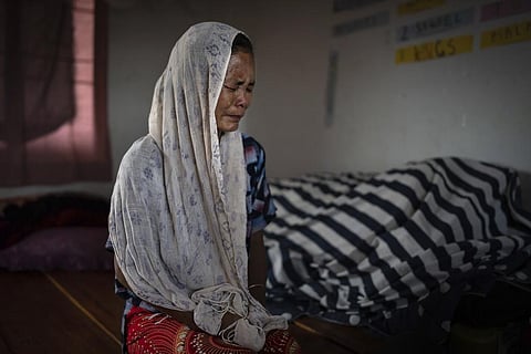 Kim Neineng, 43, a tribal Kuki, cries as she narrates the killing of her husband, at a relief camp in Churachandpur, in the northeastern Indian state of Manipur, Tuesday, June 20, 2023. (Photo | AP)