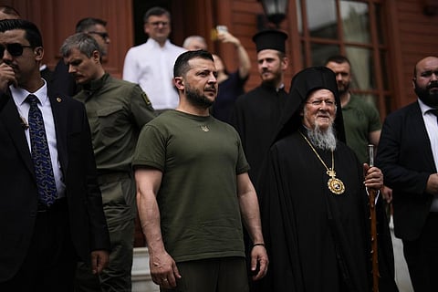 Volodymyr Zelenskyy stands next to Ecumenical Patriarch Bartholomew I, the spiritual leader of the world's Orthodox Christians in Turkey(AP)