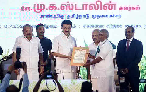 M K Stalin handing over award to farmers during the festival; visitors take a look at the items on display. (Photo | Ashwin Prasath, EPS)