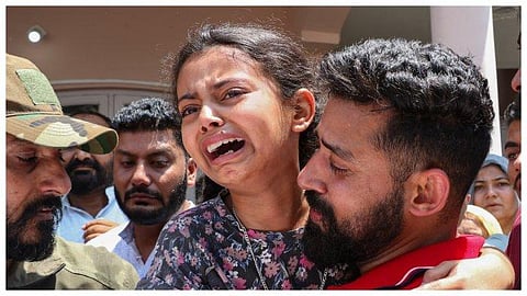 In this May 2023 image, daughter of Indian Army's Havildar Neelam Singh, who was killed in a terror strike, reacts after his mortal remains were brought at his residence. (Photo | PTI)