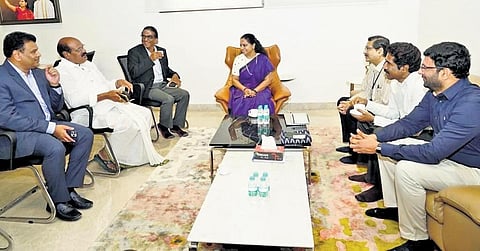 MLC K Kavitha, along with MLA Bajireddy Govardhan, speaks to the representatives of Global Logic in Hyderabad on Monday. (Photo | Express)