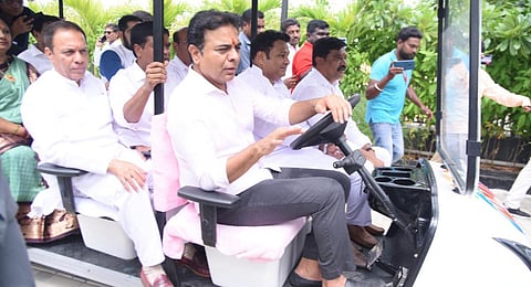 IT Minister KT Rama Rao drives a golf cart at the IT hub in Nizamabad. (Photo | Express)