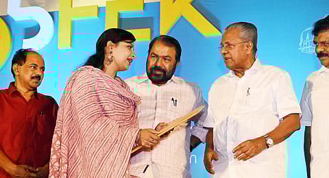 Nausheen Khan from Delhi, whose long documentary, Land of My Dreams, having a chat with the Chief Minister Pinarayi Vijayan at the concluding ceremony of 15th IDSFFK