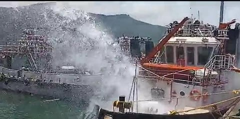 Navy's fire fighters trying to douse the fire. (Photo | EPS)