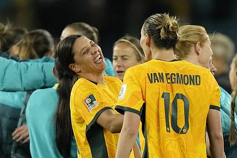 Australia's Sam Kerr laughing with teammate Emily Van Egmond after beating Denmark in the Women's World Cup round of 16 soccer match, August 7, 2023. (Photo | AP)