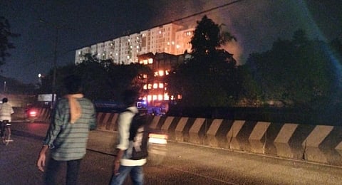 Fire broke out at a four-storeyed building in Ambattur. (Photo | Special arrangement)