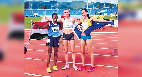 India's Asha Kiran Barla (L) with Phoebe Gill and Fleur Cooper. (Photo | Special arrangement)