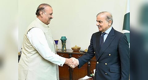 Pakistan PM Shehbaz Sharif (R) meets with Opposition leader Raja Riaz to decide on caretaker Premier ahead of the upcoming general elections. (Photo | Facebook)