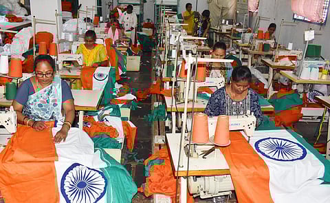 Women employees of Khadi Federation near Hubballi work full-time to meet the orders of National Flag for Independence Day. (Photo | D  Hemanth)