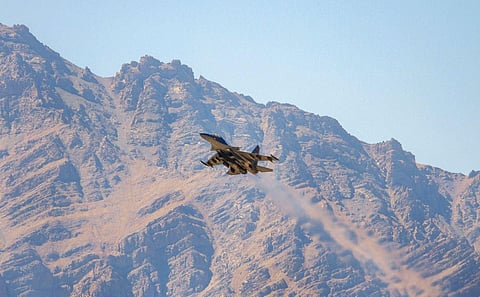 An IAF Sukhoi Su-30 jet flies over Ladakh region amid the prolonged India-China face-off, in Leh district. (File Photo | PTI)
