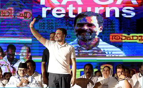 Congress leader Rahul Gandhi greets the crowd at Kalpetta on Saturday. (Photo | E Gokul)