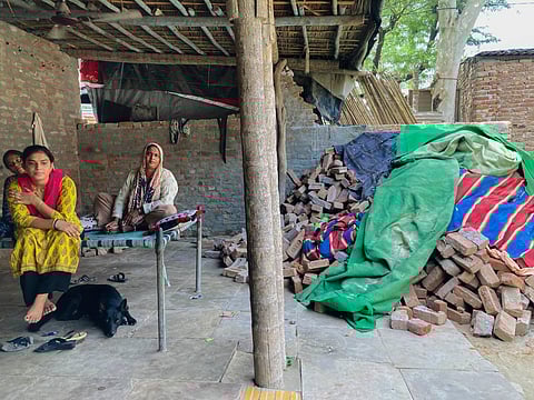 The Hindu refugees from Pakistan at their residence near the riverbank after the floodwater of Yamuna receded, at Majnu Ka Tila in New Delhi, on August 12, 2023. (PTI)