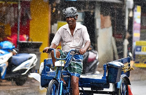 Motorists braving the rain showers at ayanavaram as chennai experienced rain in some places in Chennai. (Photo | P Ravikumar/ Express)
