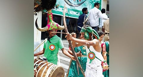 Picture of a tribal youth taking aim during the International Day of the World Indigenous Peoples celebrations. (File photo)