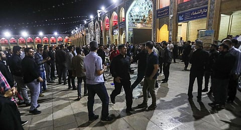 IRNA, medics carry a wounded man into an ambulance after an attack at the Shah Cheragh shrine in the southern city of Shiraz, Iran. (Photo | AP)