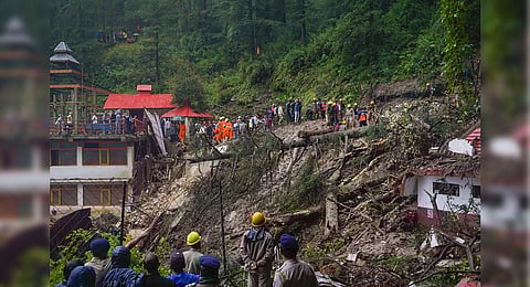 Police, district administration and locals carry out rescue operation after collapse of a temple following a massive landslide near Summer Hill in Shimla. (Photo | PTI)
