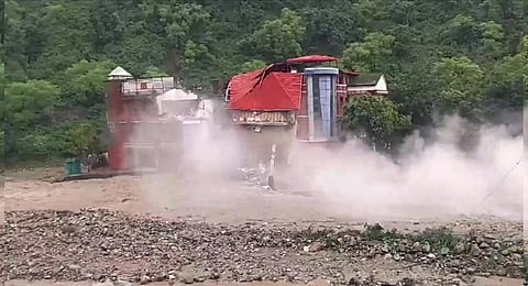 The Doon Defense College building collapses near Dehradun due to the incessant rains. (Photo | PTI)