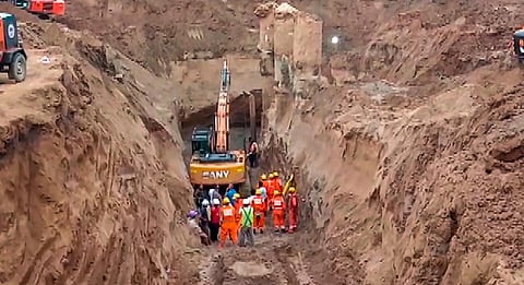 Rescue operation underway after a worker got stuck in a trench, in Jalandhar district. (Photo | PTI)
