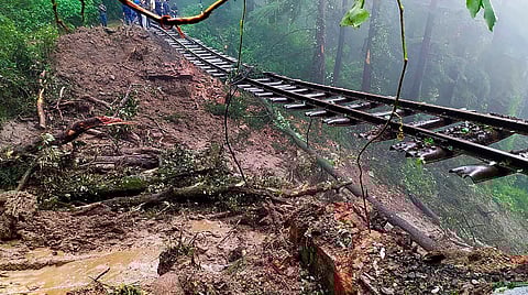 A portion of the Kalka-Shimla railway track washed away due to heavy rains, near Shimla, Monday, Aug 14, 2023. (Photo | PTI)