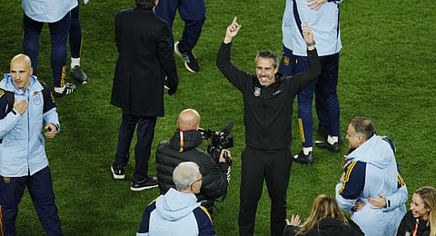 Spain's head coach Jorge Vilda, right, celebrates after their win in the Women's World Cup semifinal soccer match