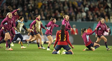 Spain's Salma Paralluelo, center, and her team celebrate after winning the Women's World Cup semifinal soccer match between Sweden and Spain at Eden Park
