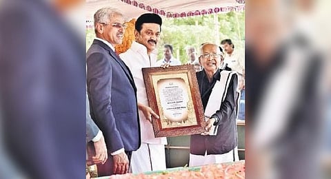 K Veeramani receiving Thagaisal Thamizhar Award from CM MK Stalin