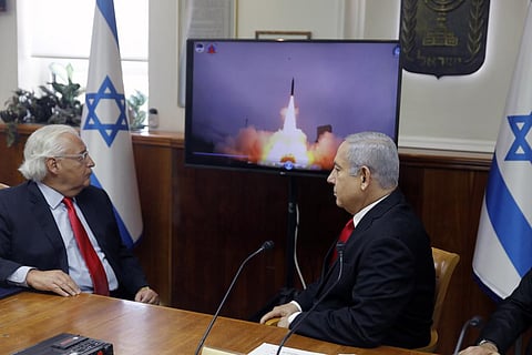 Israeli PM Benjamin Netanyahu, right, US Ambassador to Israel David Friedman watch a video which shows the launch of the Arrow 3 hypersonic anti-ballistic missile in Jerusalem in 2019. (Photo | AP)