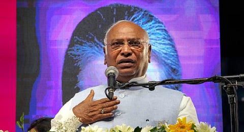 Congress President Mallikarjun Kharge addresses during a national convention of Mahila Congress' Block Presidents and Office Bearers, in New Delhi.(Photo | PTI)