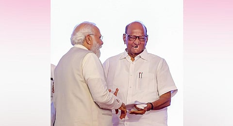 FILE - NCP chief Sharad Pawar interacts with PM Narendra Modi interacts at the Lokmanya Tilak National Award ceremony, in Pune, Tuesday, Aug. 1, 2023. (Photo | PTI)