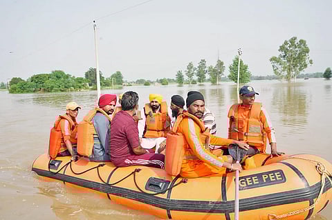 Punjab Chief Minister Bhagwant Mann inspects the flood-affected areas of Hoshiapur on Thursday. (ANI Photo)