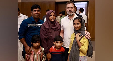 Harshina and her family with Rahul Gandhi at Wayanad. (Photo | Express)