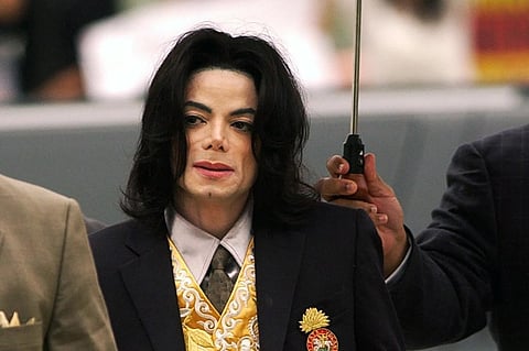 FILE - Michael Jackson arrives at the Santa Barbara County Courthouse for his child molestation trial in Santa Maria, Calif., May 25, 2005. (Photo | AP)