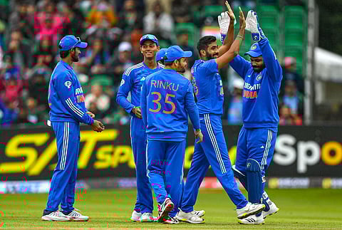 India's Jasprit Bumrah celebrates with teammates during the 1st T20 cricket match against Ireland, at The Village stadium in Malahide, Ireland, Friday, Aug. 18, 2023. (Photo | PTI)