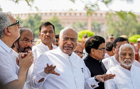Congress President Mallikarjun Kharge with MPs from the opposition alliance 'INDIA' addresses the media at Vijay Chowk, in New Delhi, Tuesday, Aug. 1, 2023. (Photo | PTI)