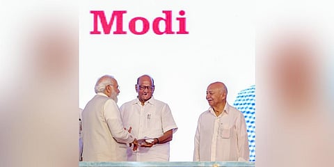 Prime Minister Narendra Modi interacts with NCP chief Sharad Pawar and Congress leader Sushilkumar Shinde at the Lokmanya Tilak National Award ceremony, in Pune. (Photo | PTI)