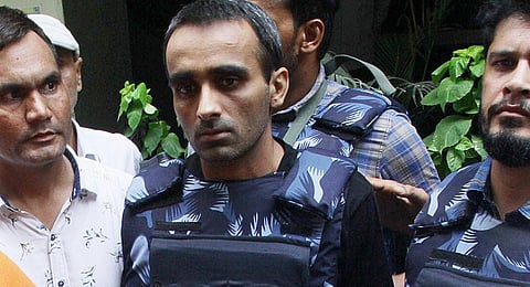 Sachin Bishnoi in police custody in New Delhi on Tuesday.(Photo | Shekhar Yadav, EPS)