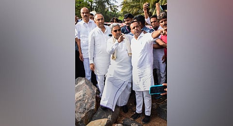 Karnataka Chief Minister Siddaramaiah with the Legislative Assembly speaker UT Khader and state Cabinet Minister Dinesh Gundu Rao visits Batapady Beach area (Photo | PTI)